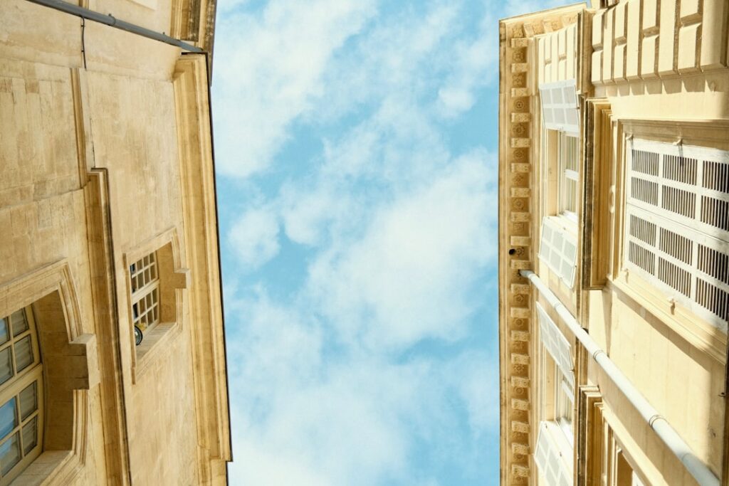 a-couple-of-buildings-that-are-next-to-each-other-iyddabmdjwq